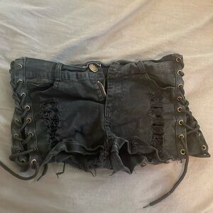 Black pair of Be Wicked shorts with lace up sides